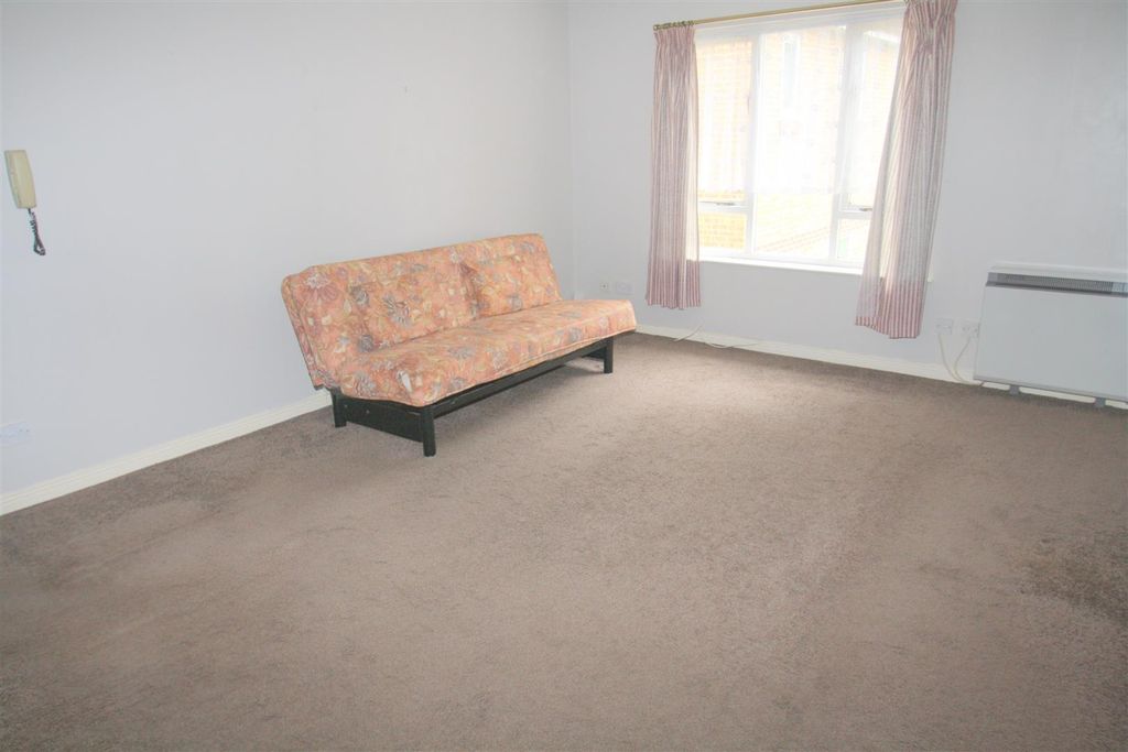 Property photo 2 of 5 Living Area.Jpg