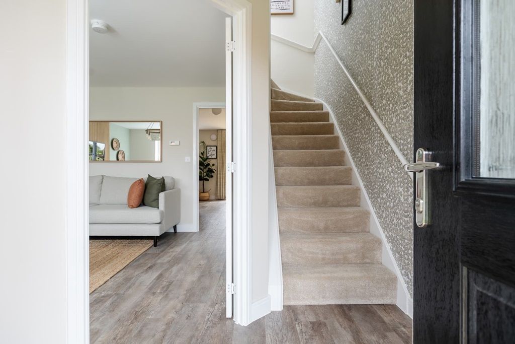 Property photo 3 of 12 A Welcoming Hallway With Storage