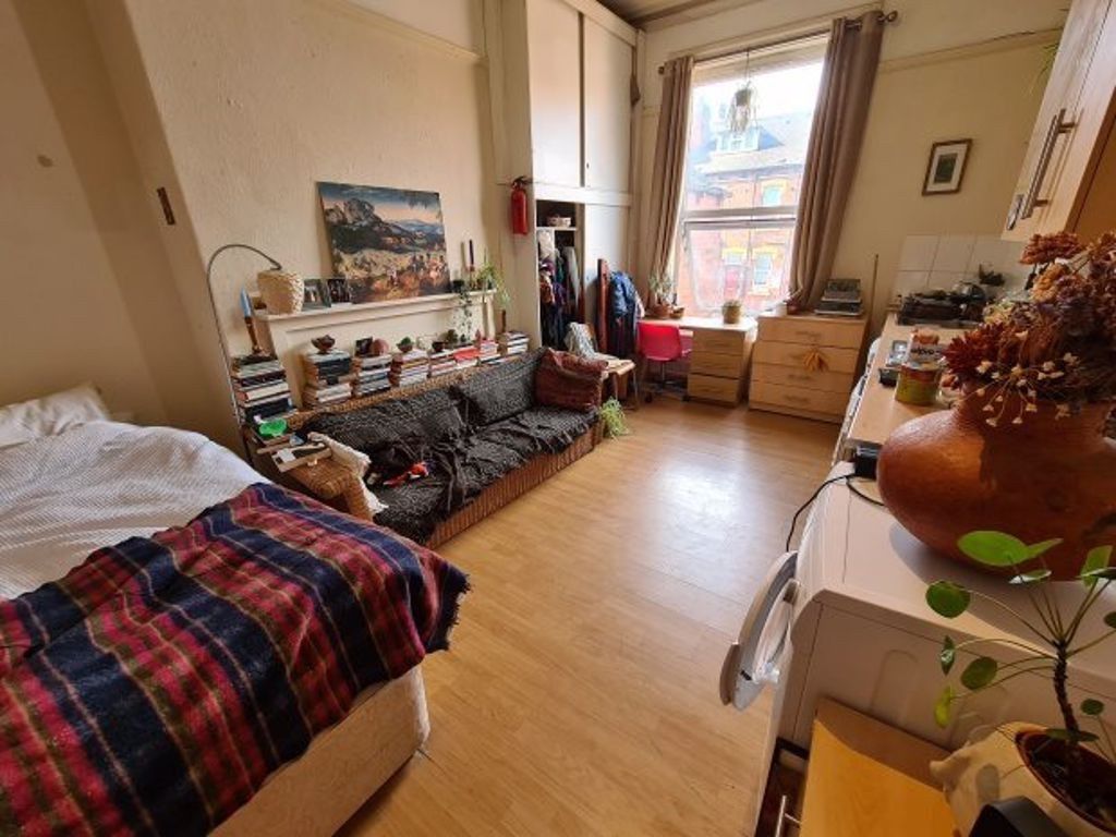 Property photo 1 of 3 Bright And Cozy Bedroom Featuring A Large Window T...