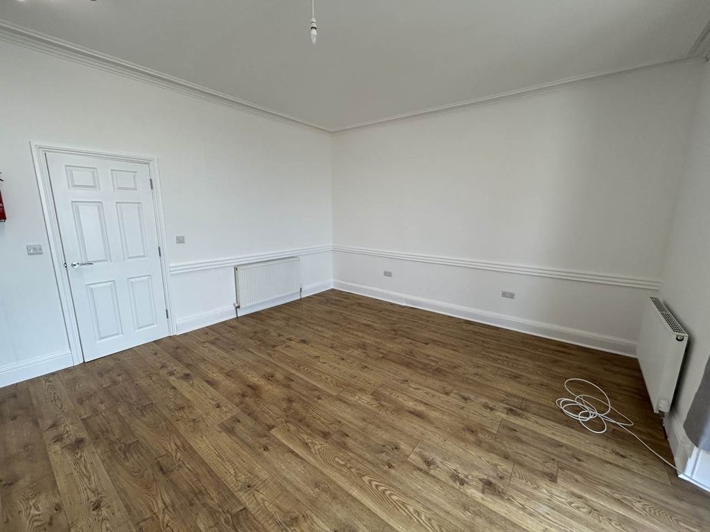 Property photo 3 of 6 Living Area