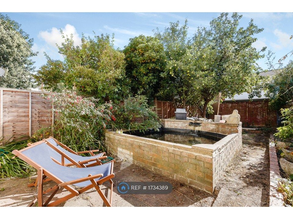 Property photo 2 of 12 Southerly Facing Garden With Raised Pond