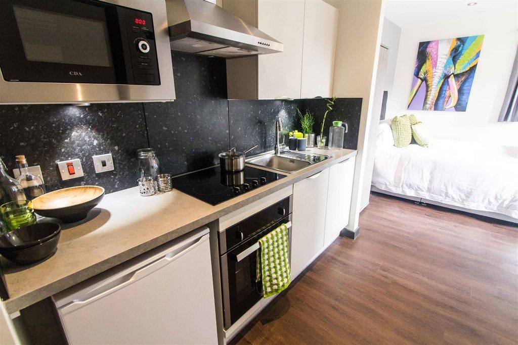 Property photo 2 of 5 Modern Studio Kitchen With Sleek Appliances...