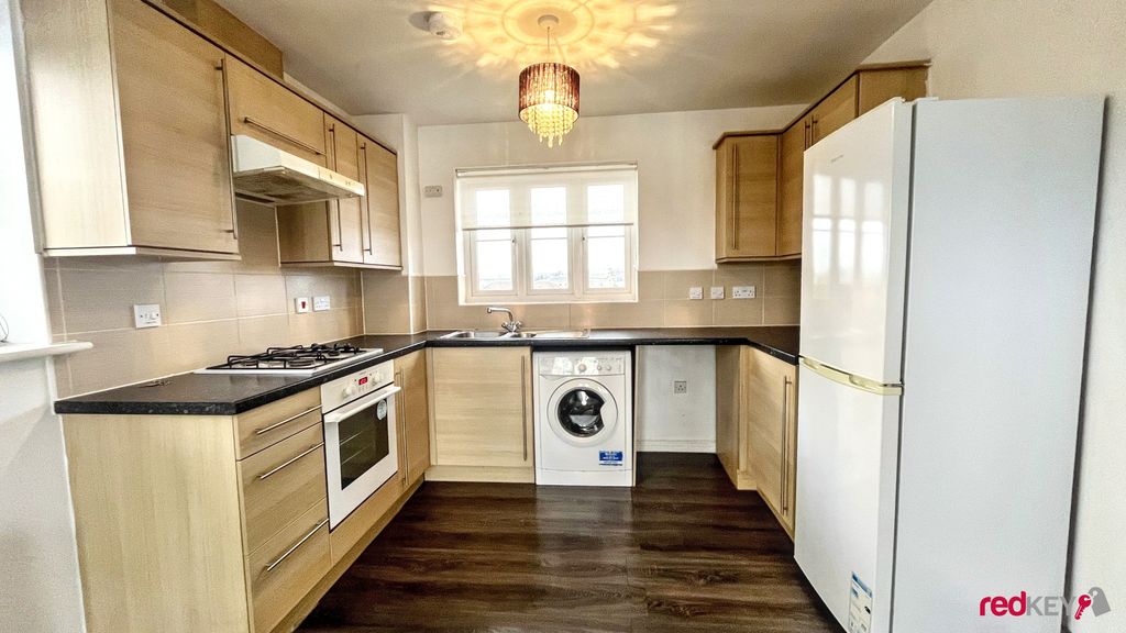 Property photo 3 of 7 Kitchen