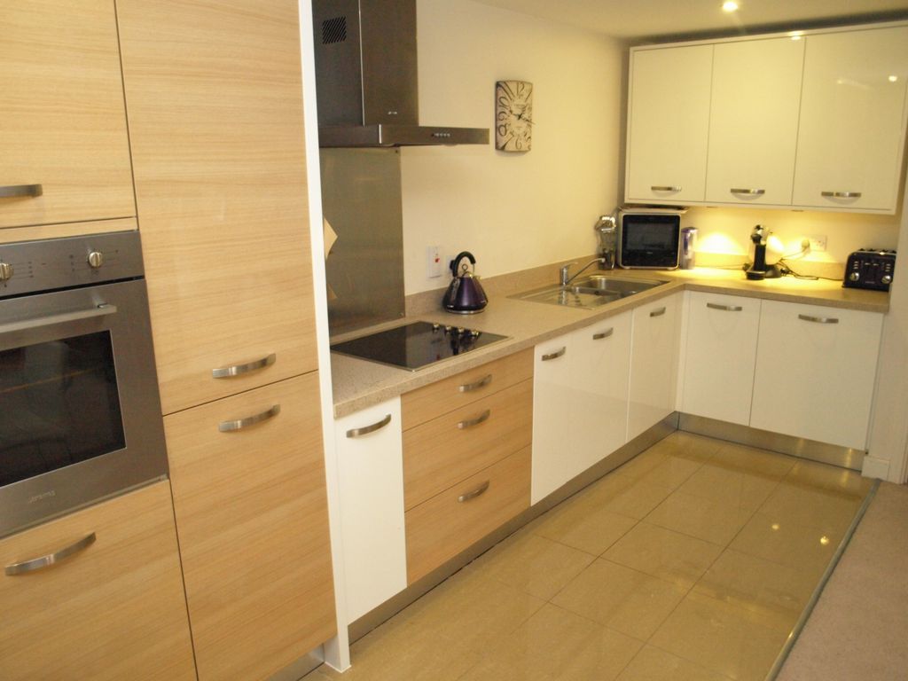 Property photo 3 of 7 Kitchen Area