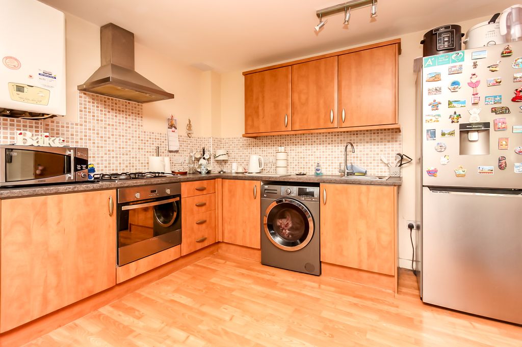 Property photo 3 of 8 Kitchen Area