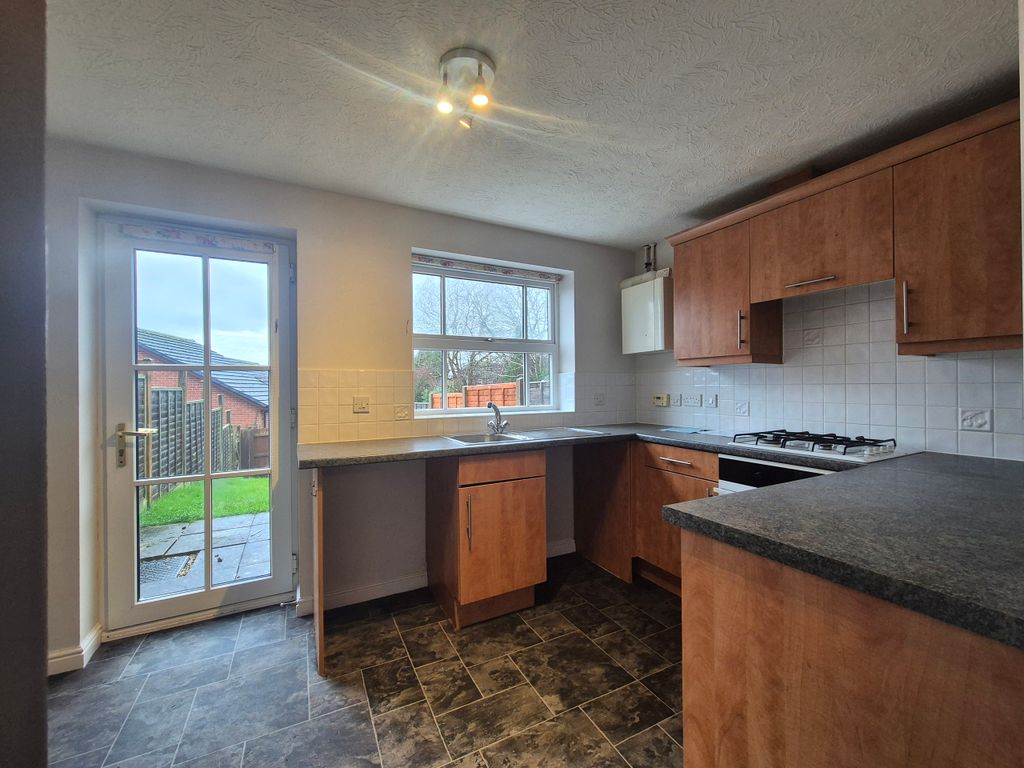 Property photo 3 of 8 Kitchen