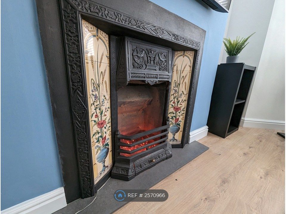 Property photo 3 of 14 Fireplace
