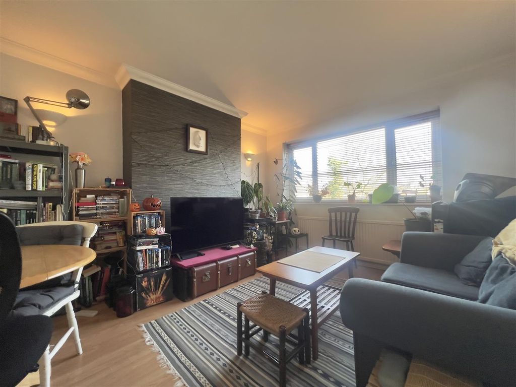 Property photo 3 of 8 Living Area