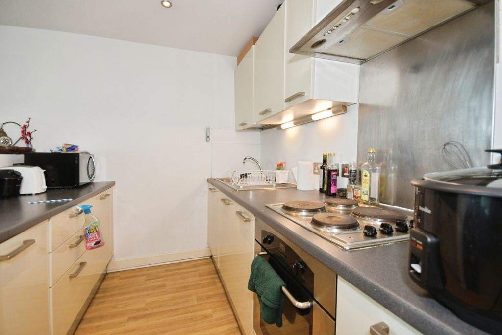 Property photo 3 of 12 Kitchen