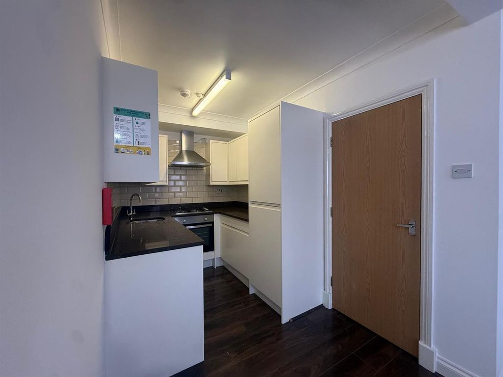 Property photo 3 of 12 Kitchen