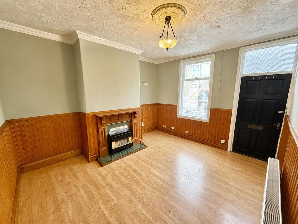 Property photo 3 of 12 Living Room: