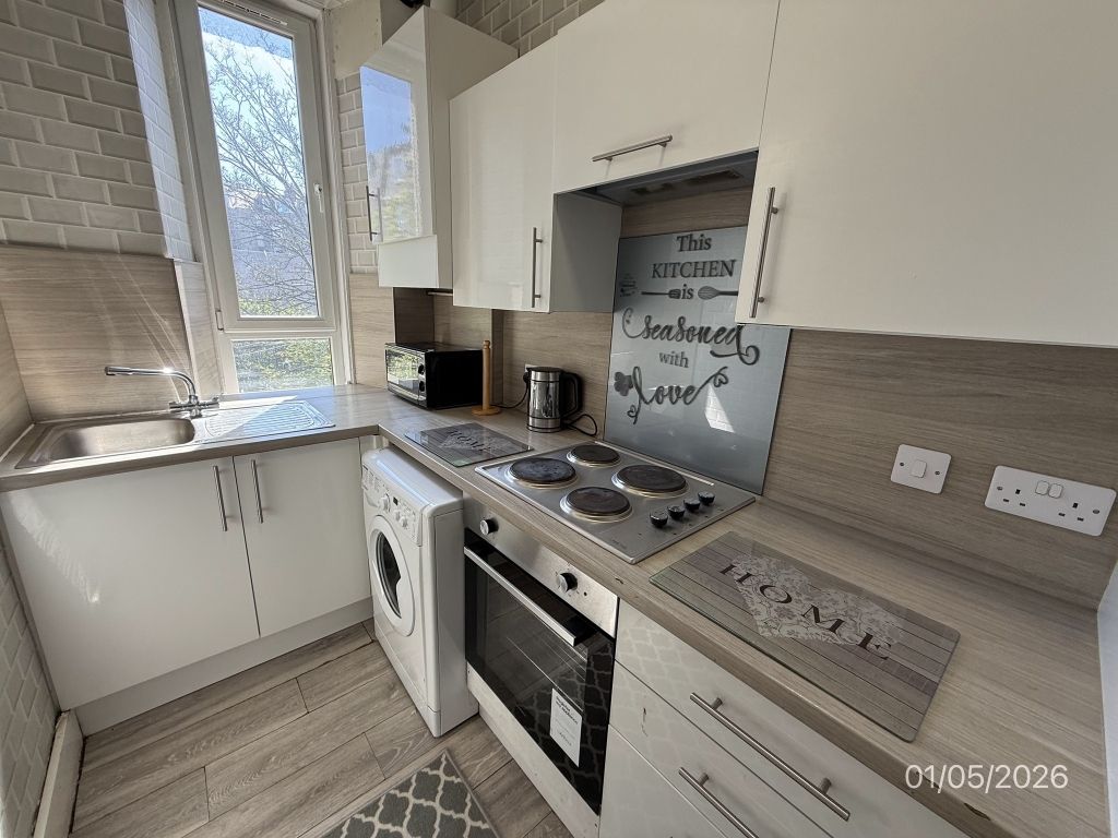 Property photo 2 of 11 Kitchen