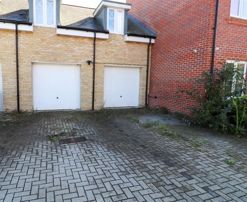 Property photo 3 of 13 Garage &amp; Driveway