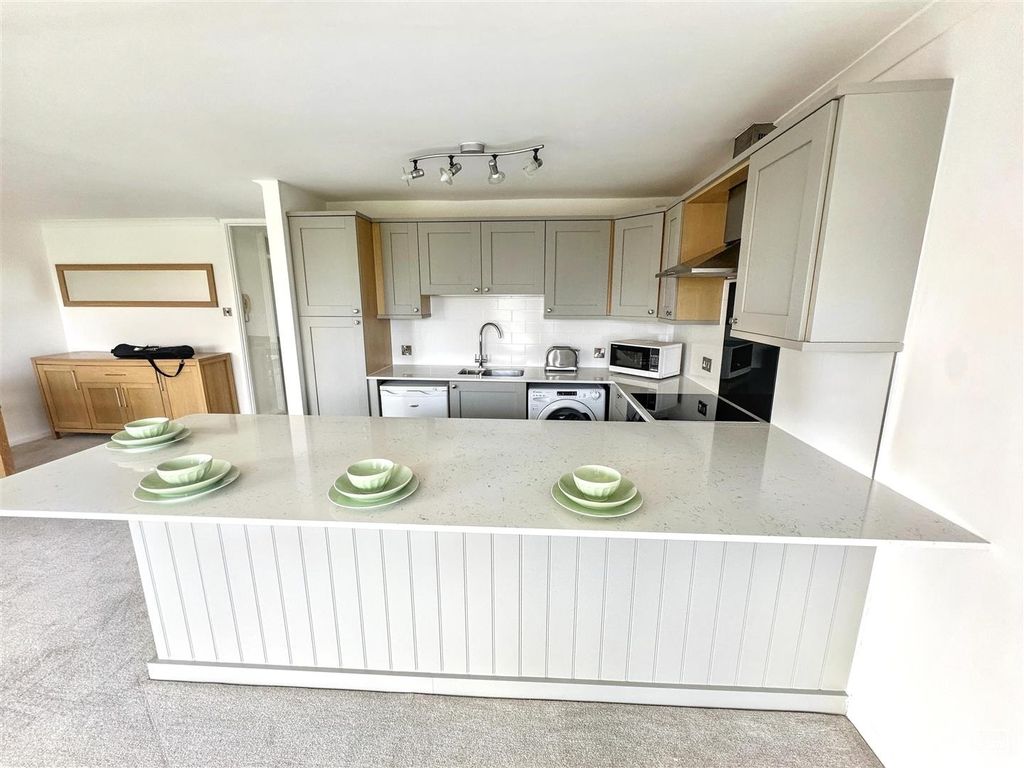 Property photo 1 of 11 Modern Kitchen With Stylish Breakfast Bar Island...