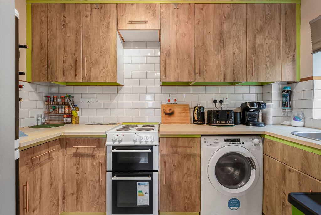 Property photo 3 of 12 Kitchen