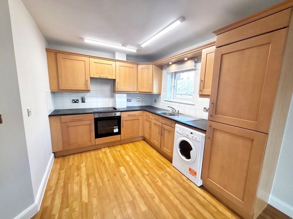 Property photo 1 of 9 Kitchen