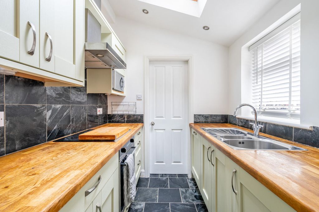 Property photo 3 of 12 Kitchen