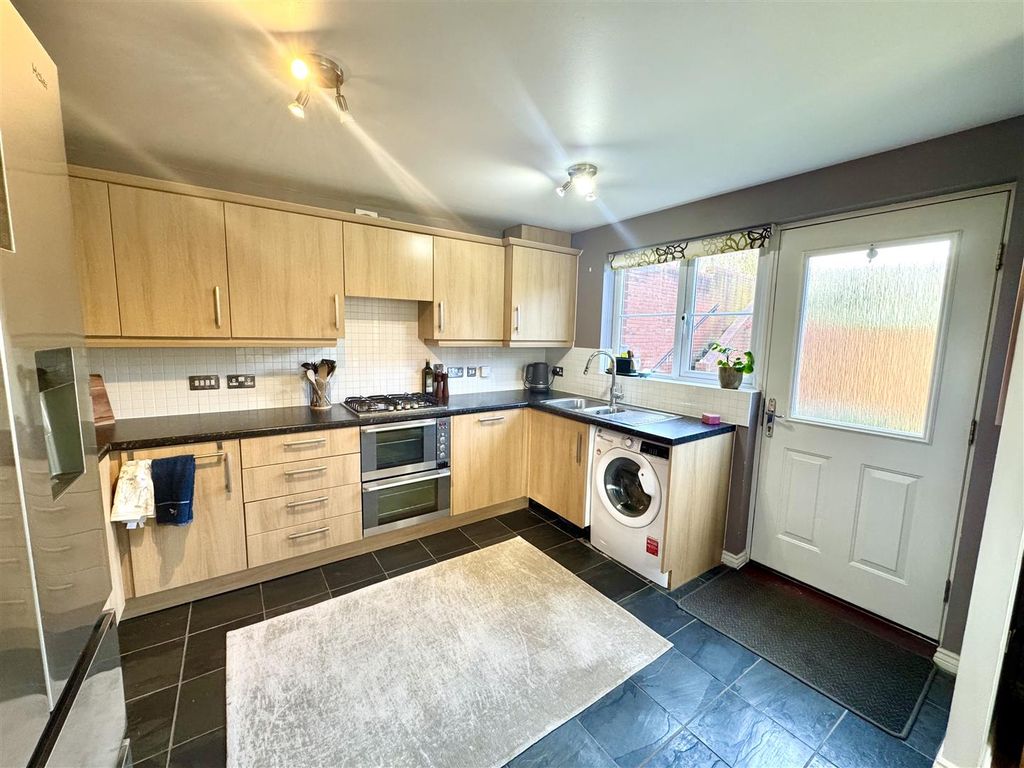 Property photo 3 of 22 Kitchen/Dining/Family Room