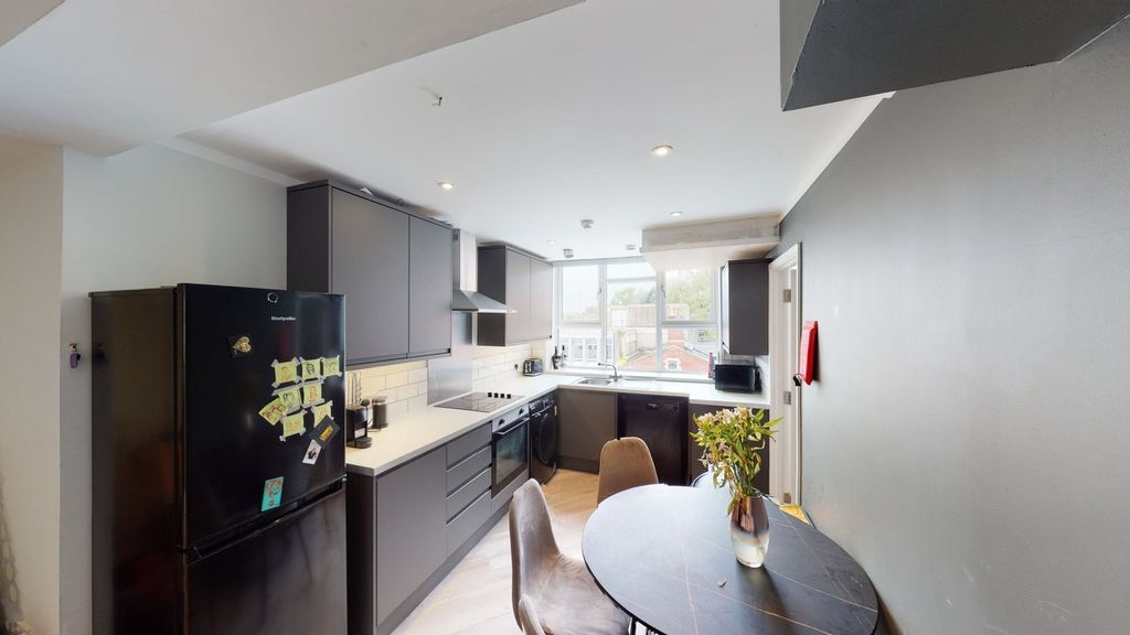 Property photo 3 of 6 A Modern And Well-Lit Kitchenette Featuring Sleek ...