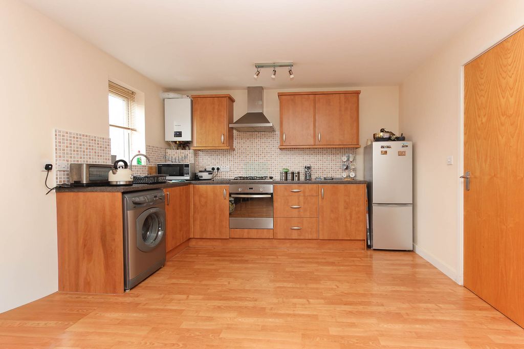 Property photo 3 of 7 Kitchen Area