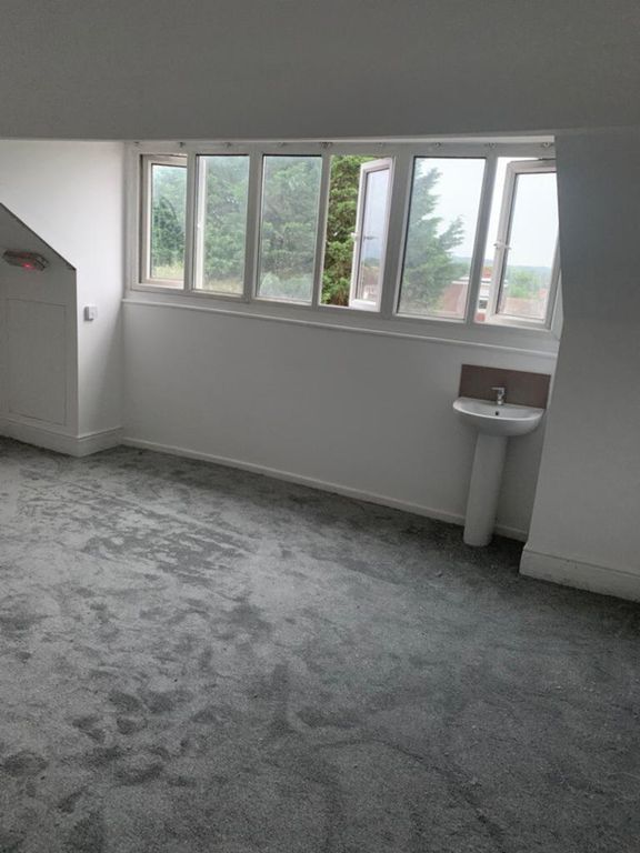 Property photo 3 of 12 This Inviting Double Bedroom Features Large Window...