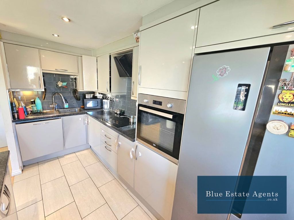 Property photo 2 of 16 Kitchen Area