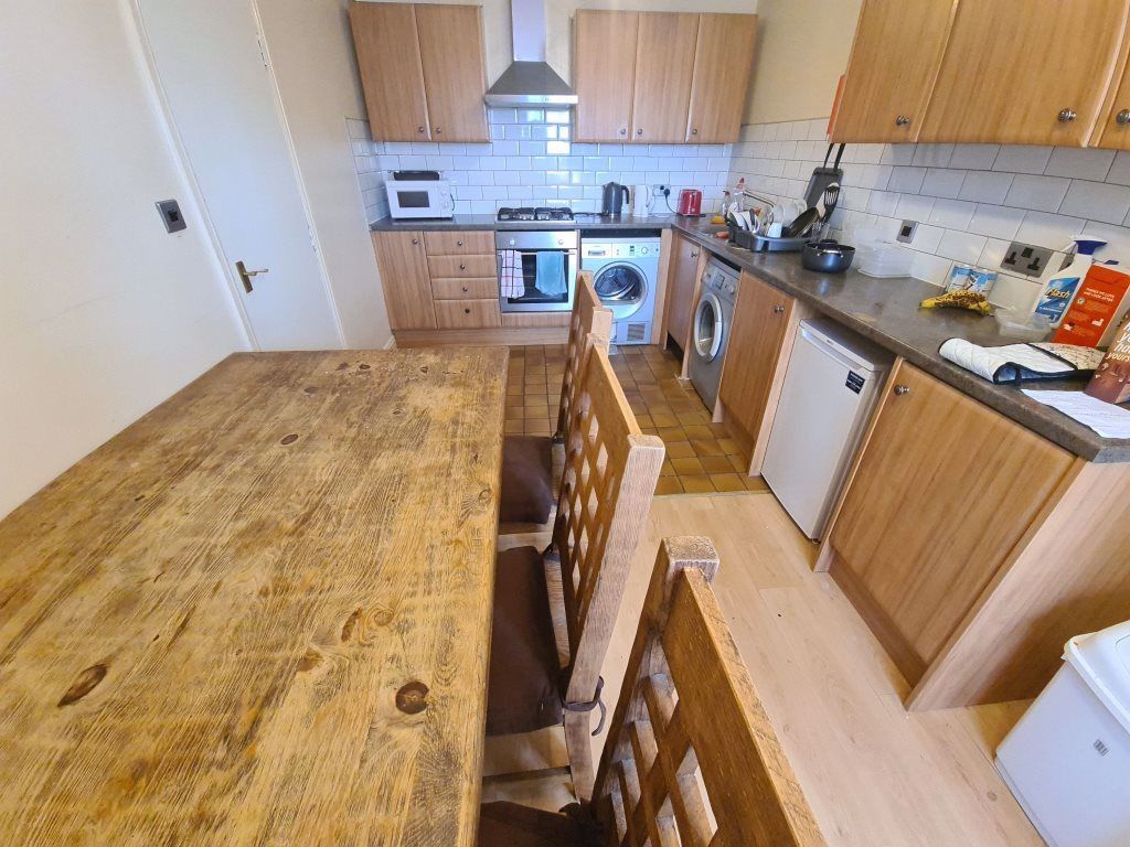 Property photo 3 of 18 Bright Shared Kitchen With Wooden Cabinetry, A Lar...