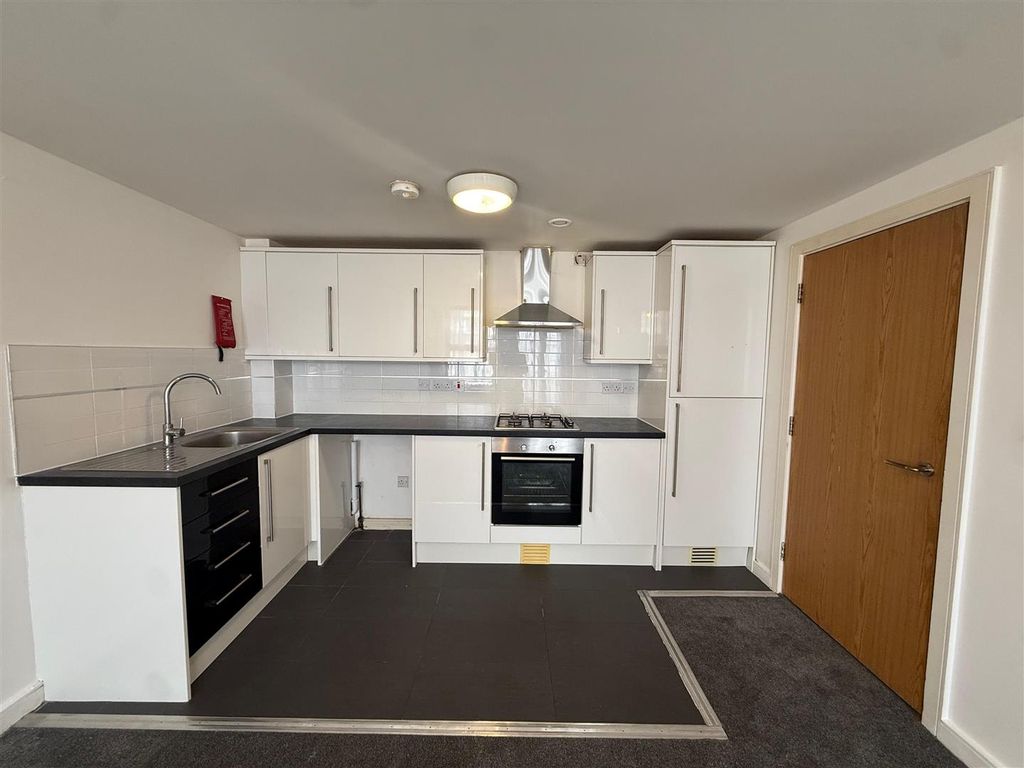 Property photo 1 of 7 Kitchen