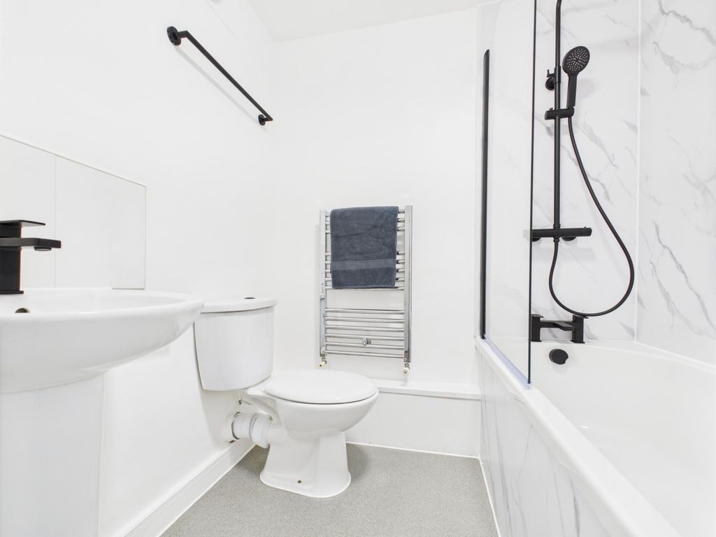 Property photo 3 of 4 Fresh, Modern Bathroom With A White Suite, Bathtub...