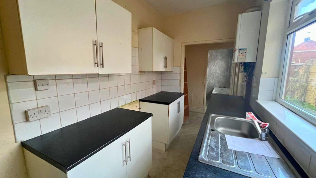 Property photo 3 of 4 Kitchen