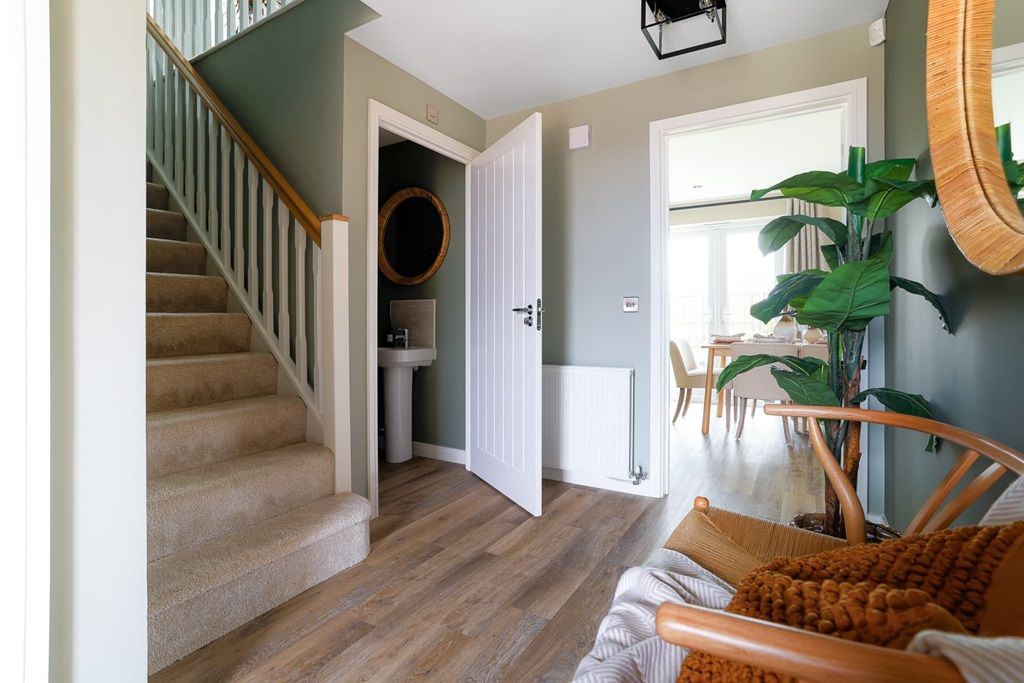 Property photo 2 of 12 The Maxwell Has A Bright And Welcoming Hallway