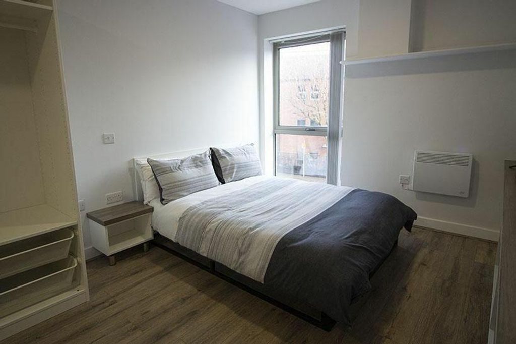 Property photo 2 of 4 Bright And Inviting Double Bedroom Featuring Large...