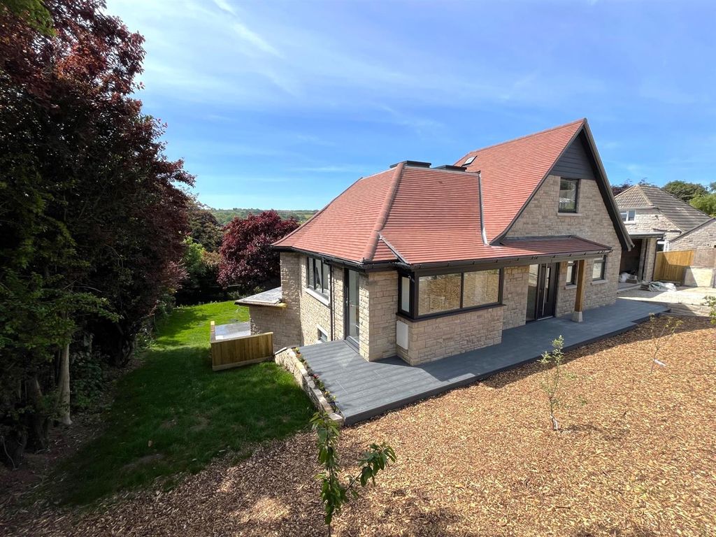 Property photo 3 of 12 Front And Side Elevations