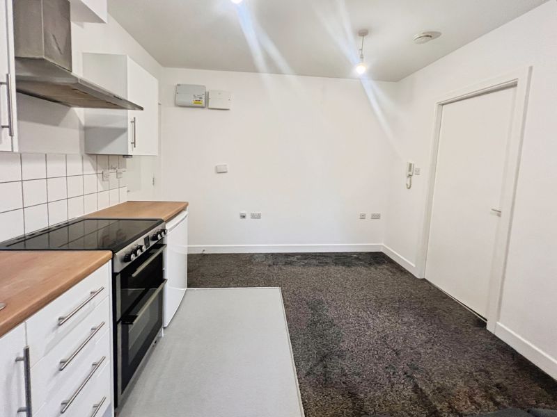 Property photo 2 of 9 Kitchen Living Area