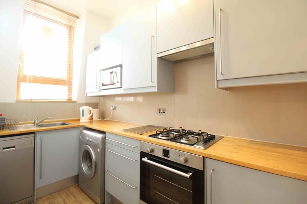Property photo 3 of 8 Kitchen