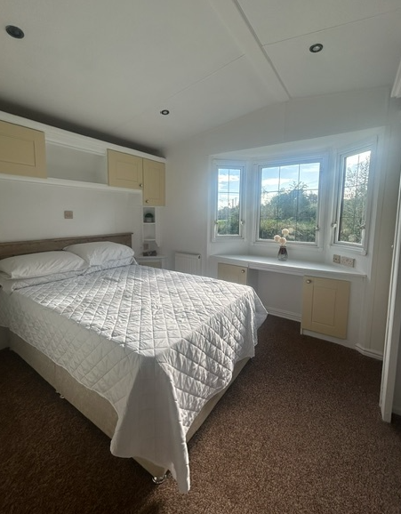 Property photo 3 of 4 Abi Westwood Main Bedroom With Double Bed, Fitted Storage And Large Bay Window