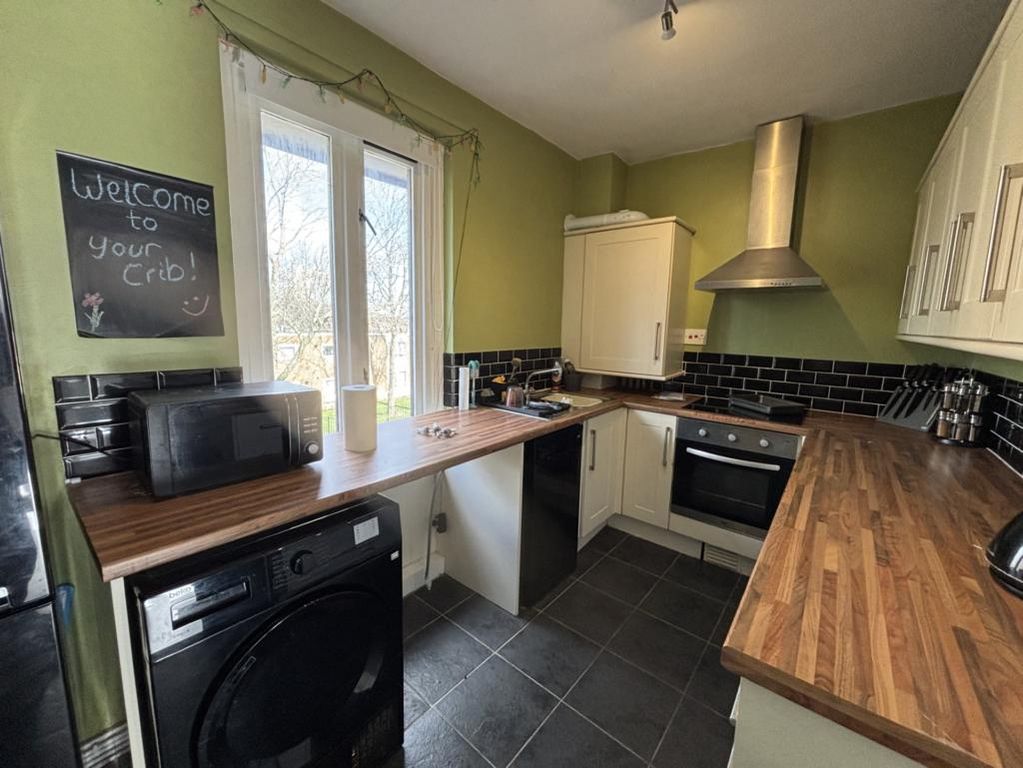 Property photo 3 of 7 Kitchen