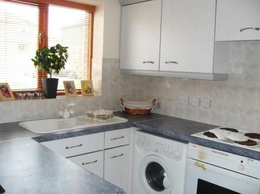 Property photo 2 of 12 Kitchen