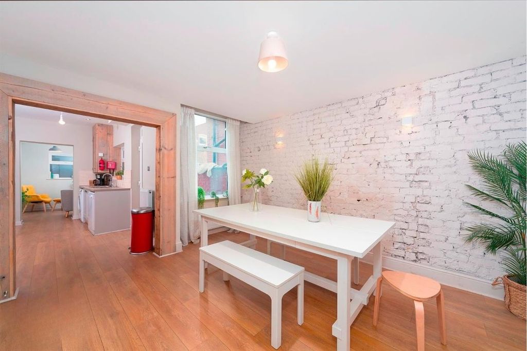 Property photo 1 of 10 Bright Dining Area With White Brick Feature Wall...