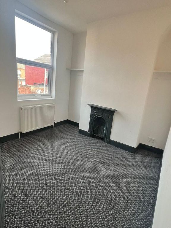 Property photo 3 of 12 A Bright, Well-Maintained Living Space Featuring A...