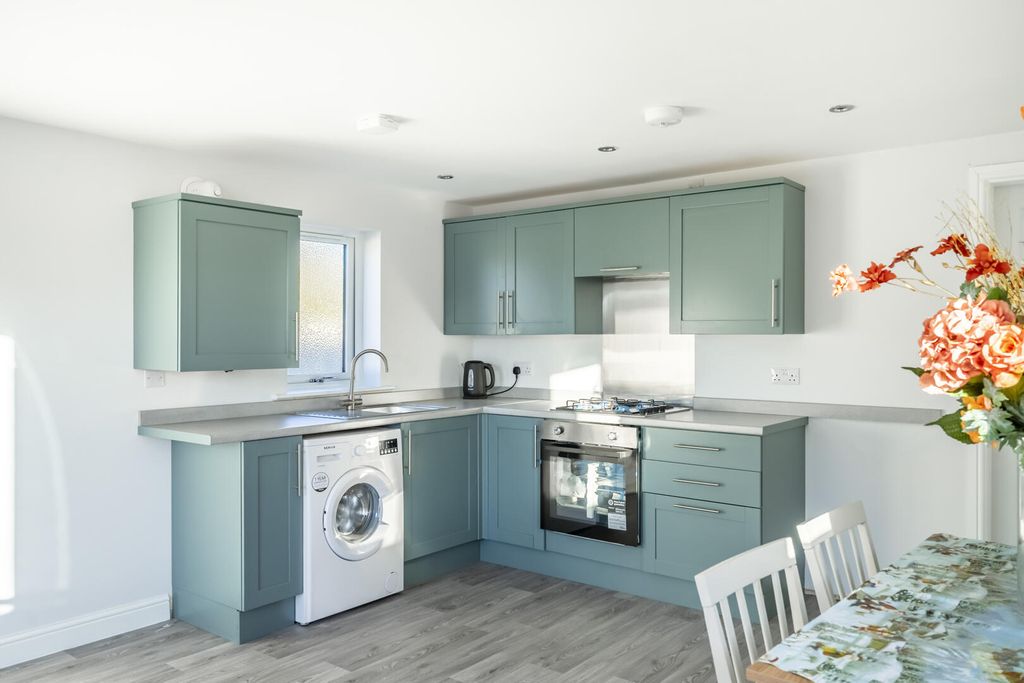 Property photo 2 of 12 Kitchen