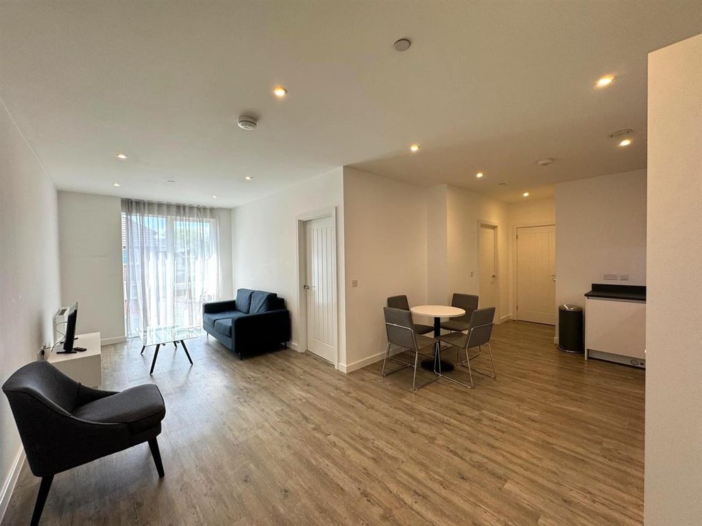 Property photo 2 of 12 Living Area.Jpg