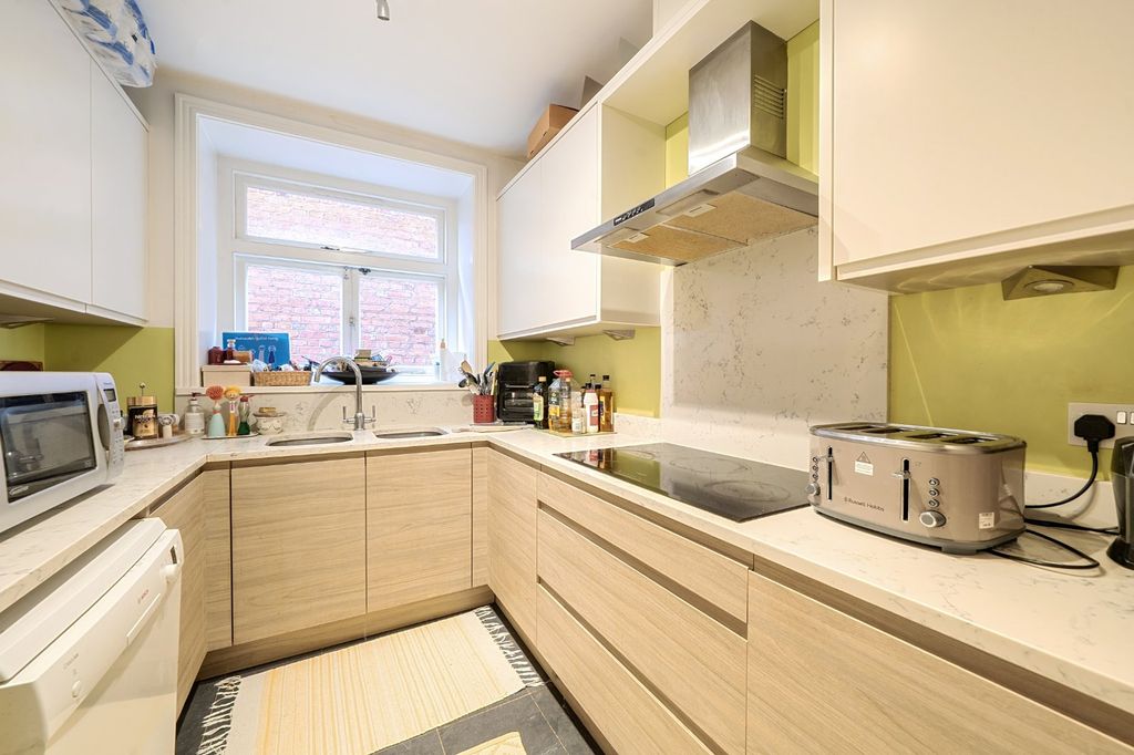 Property photo 3 of 17 Kitchen