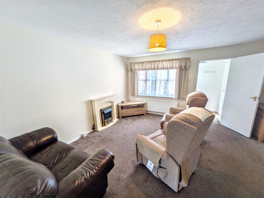 Property photo 3 of 16 Living Area