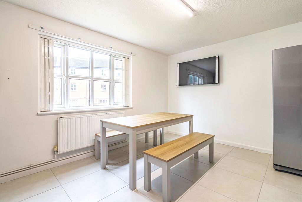 Property photo 2 of 9 Bright And Modern Kitchen Featuring A Large Window...