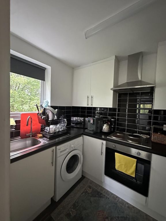 Property photo 3 of 7 Kitchen