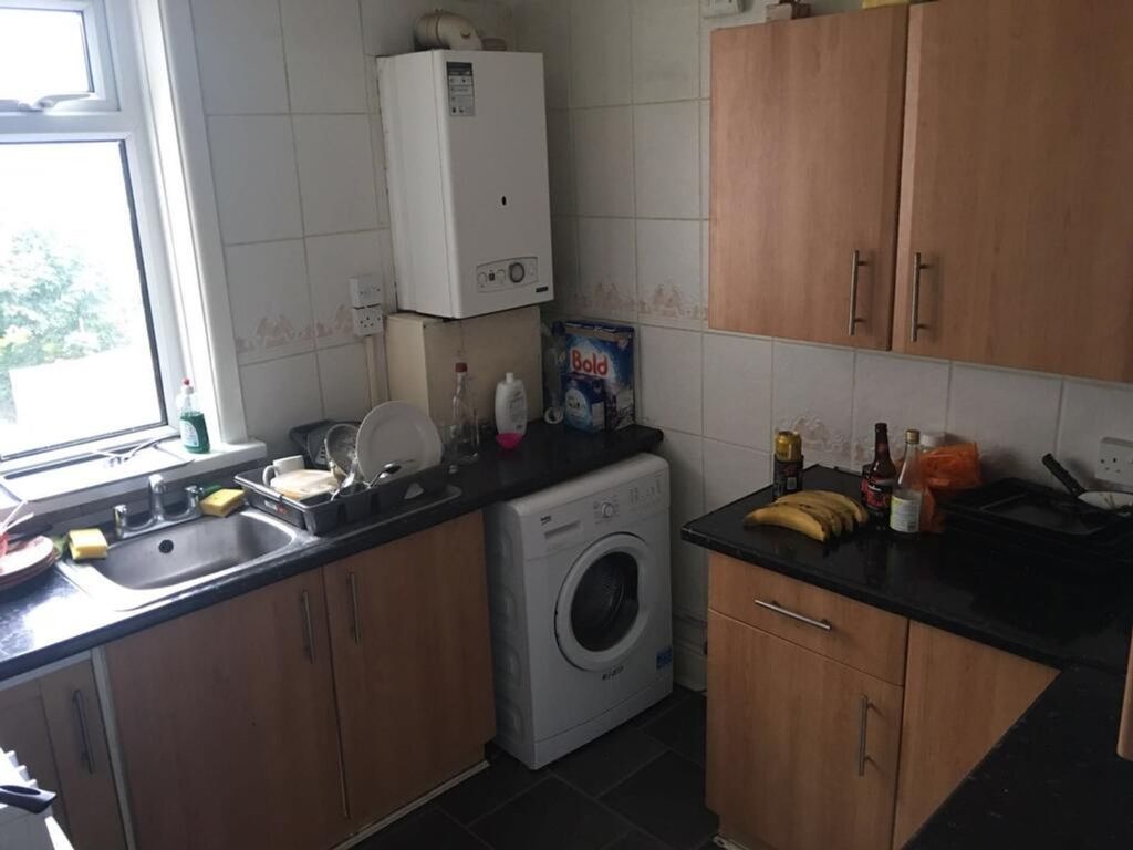 Property photo 1 of 12 Bright Kitchen Featuring Modern Cabinetry, Ample c...
