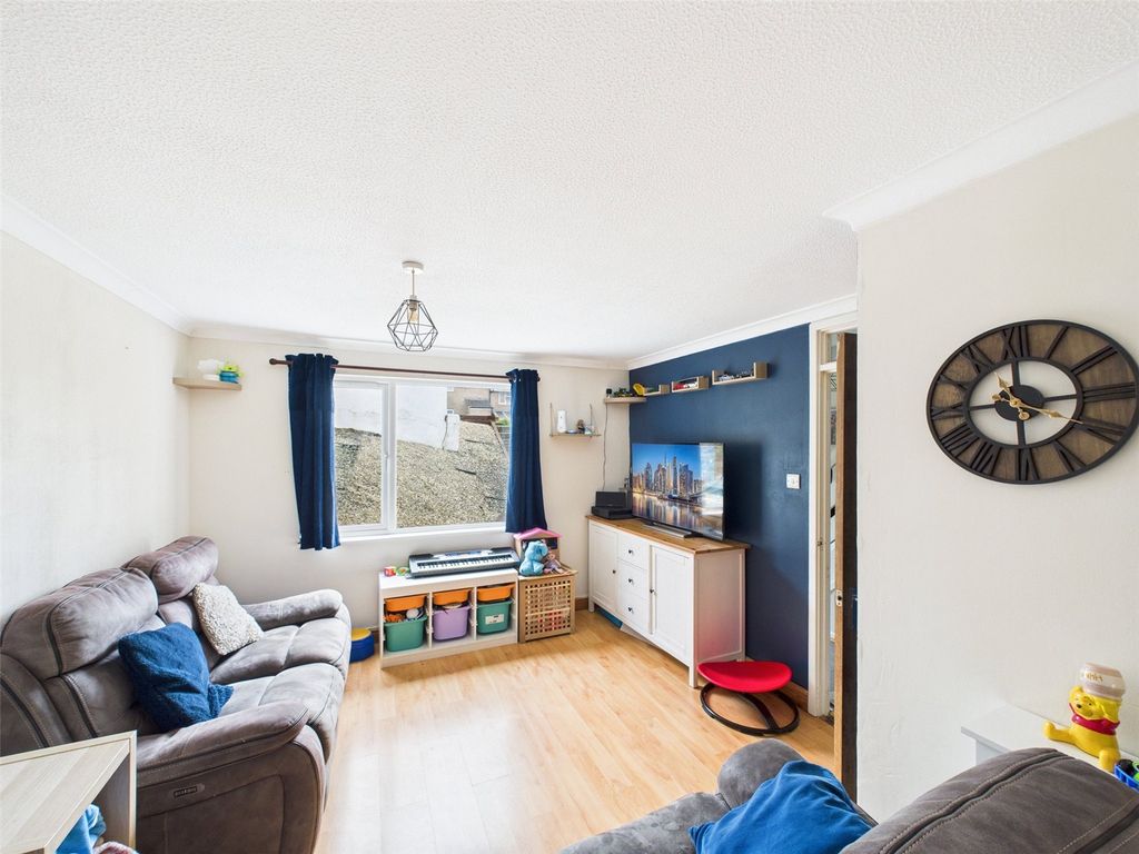 Property photo 3 of 12 Living Area