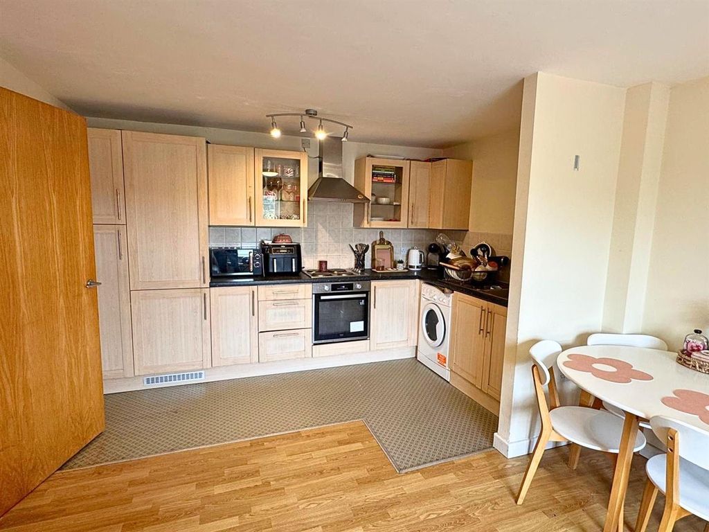 Property photo 3 of 6 Kitchen Living Area