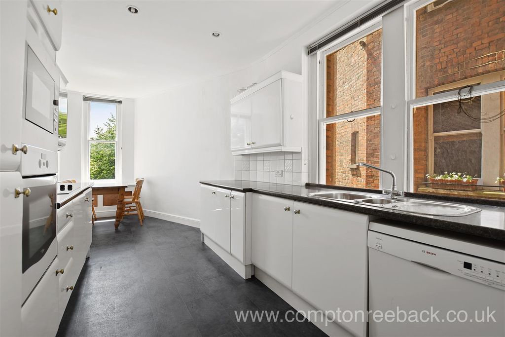 Property photo 2 of 8 Kitchen